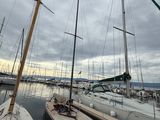 many sailboats that are docked in the water