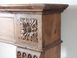 a wooden table with a drawer on top of it