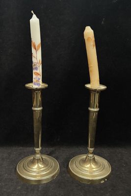 pair of antique brass candlesticks with hand painted floral designs