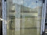 a large window that is sitting on a pallet