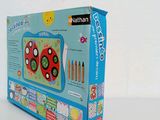 a box with a drawing set in it on a table