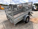 a small trailer with a cage on the back of it