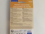 a close up of a package of calculator on a white surface