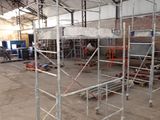 scaffolding in a building with a lot of scaffolding around it