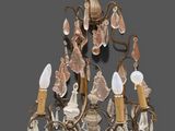 an image of a chandelier with several lights hanging from it