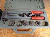 a tool box with tools in it on a table