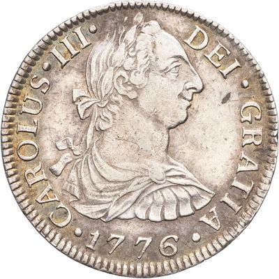 une pièce d'argent représentant une femme