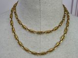 a gold chain necklace on a mannequin mannequin mannequin mannequin mannequin mannequin mannequin mannequin manne
