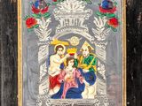 a picture of a painting of a family in a frame