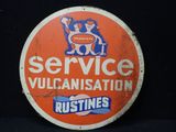 un panneau orange et blanc sur lequel est inscrit « service de vulcanisation »