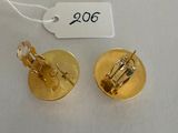 pair of gold plated earrings with a car on them
