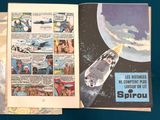 an image of a comic book opened to a page with a picture of a space shuttler