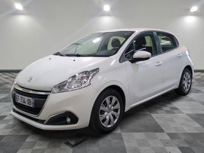 the white car is parked on a checkered tile floor