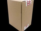 a cardboard box that has been opened on a black background