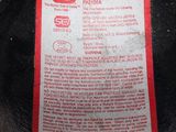 a label on the back of a frying pan on the stove