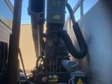 a view through a hole in the side of a truck