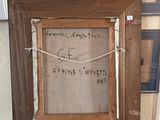 an old picture frame with a message on it sitting on a counter