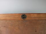 a close up of a piece of wood on a table