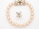 a pearl and diamond bracelet and earring set