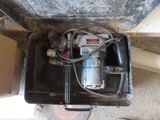 an image of a tool box with a drill in it