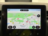 a gps screen on the dashboard of a car