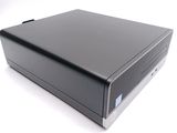 an image of a black desktop computer sitting on top of a white surface