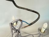 a light that is on in the middle of a wire