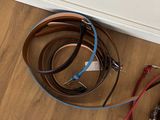a lot of wires that are laying on the floor