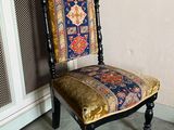 a chair that is sitting in the corner of a room