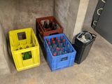 three plastic containers sitting next to each other on the floor