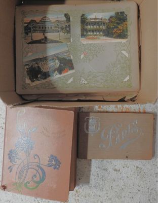 a box that has some pictures in it on the floor