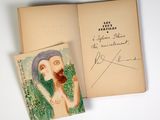 an open book with a picture of a man with a beard and a picture of a man with a mustache