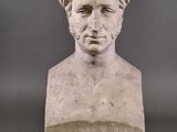 marble bust of a man with a beard and a moustache