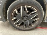 a close up of a tire on the side of a car