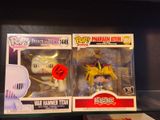 two boxes that have some action figures inside of them