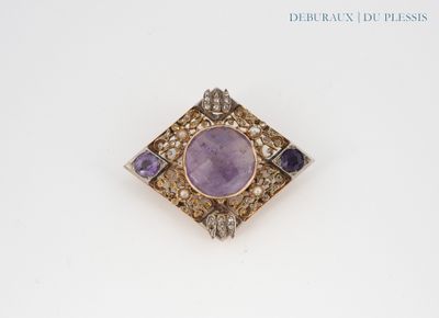 an amethorate and diamond broochle set in 18k gold