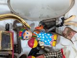 a box full of toys and a mirror on a table
