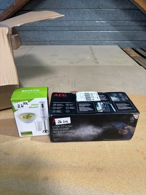 a box of food sitting on the floor next to a cardboard box