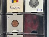a box of coins with different types of coins in it