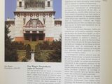 an open book with a picture of a building on it