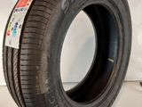 a close up of a tire on a white surface
