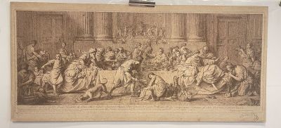 an old picture of a group of people sitting around a table