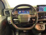 the interior of a car with a steering wheel, dashboard, and dash board