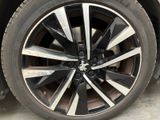a close up view of a tire on a car