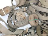 a lot of belts that are laying on the ground