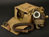 a gas mask and a hose on a black background
