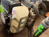 a small machine that is sitting on the ground