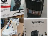 four pictures of a box of nespresso coffee machines and a box of nespresso coffee machines