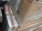 a pile of boxes sitting on top of a pallet