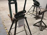 two machines that are sitting in a garage